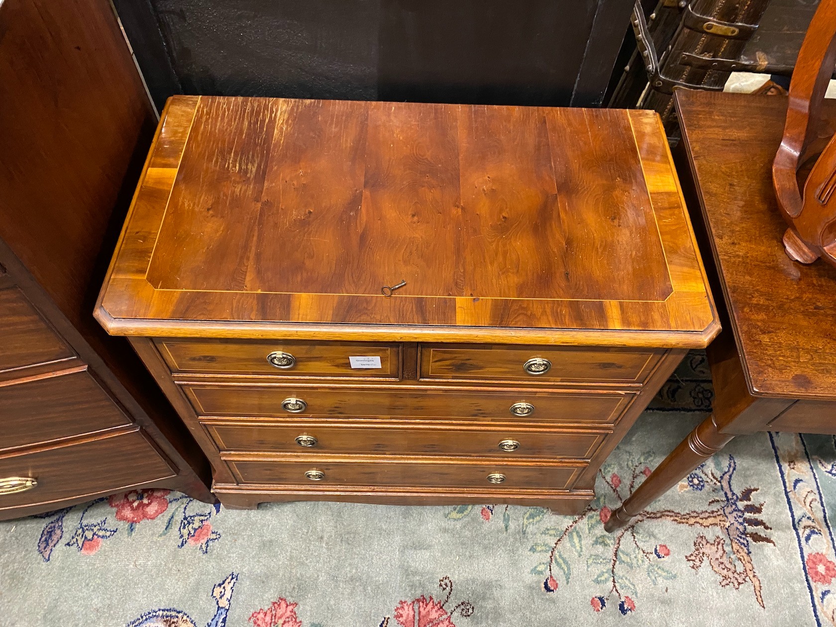 A George III style banded and inlaid yew veneered chest of drawers, width 77cm, depth 42cm, height 75cm